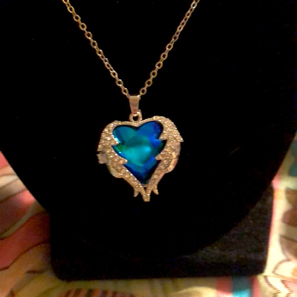 A beautiful blue stone locket necklace